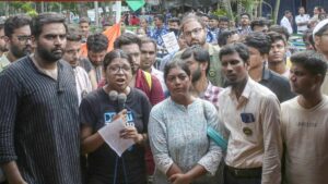 A junior doctor addresses during the second day of their sit-in demonstration in front of Swasthya Bhawan over RG Kar Hospital rape-murder case, in Kolkata on Wednesday, September 11